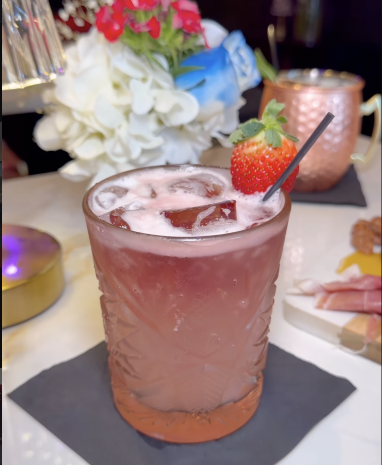 Strawberry cocktail with fresh garnish at Babe Coffee Lounge